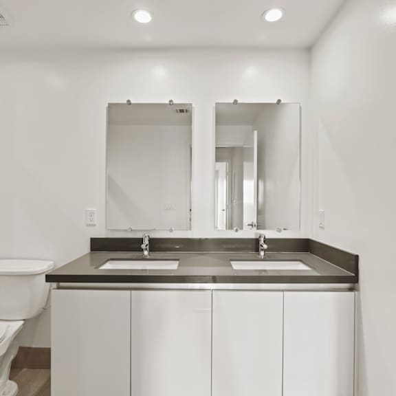 bathroom with double-sink vanity at gramercy park by wiseman, los angeles, 90004