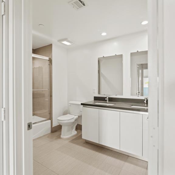 bathroom with bathtub at gramercy park by wiseman, los angeles, ca