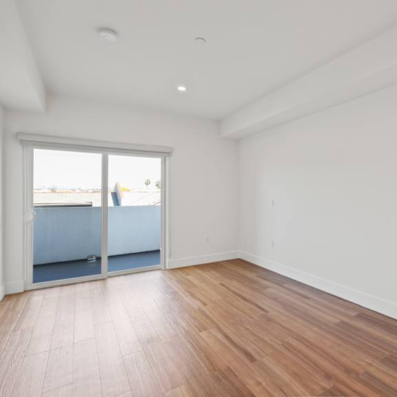 living room with recessed lighting at gramercy park by wiseman, los angeles, 90004