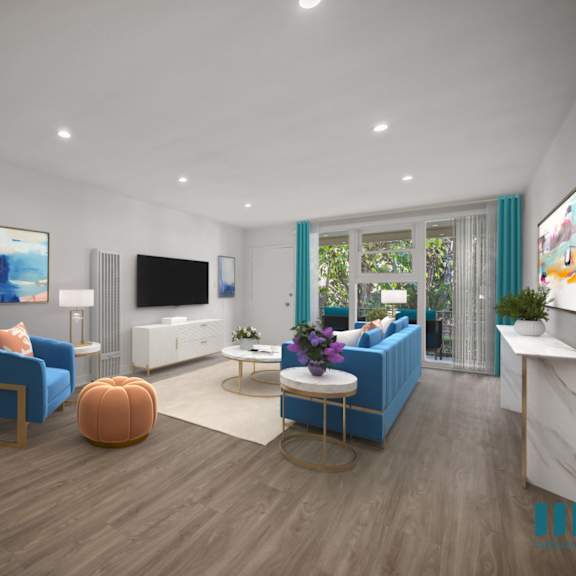 a modern living room with a blue sofa and a television.
