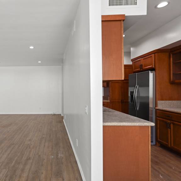 open-concept kitchen and living room areas