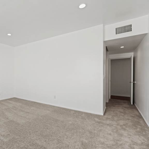 bedroom with recessed lighting and carpet