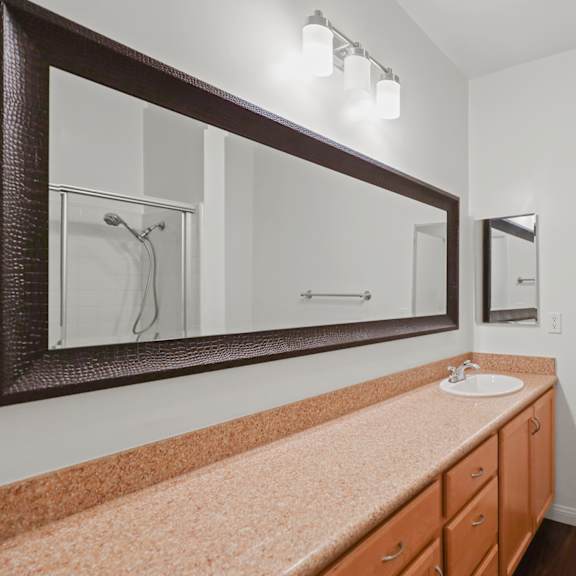 bathroom with cabinet storage