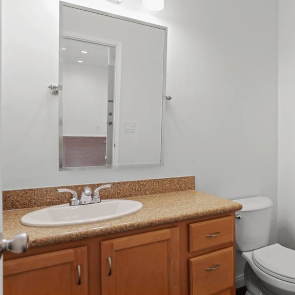 bathroom with cabinet storage