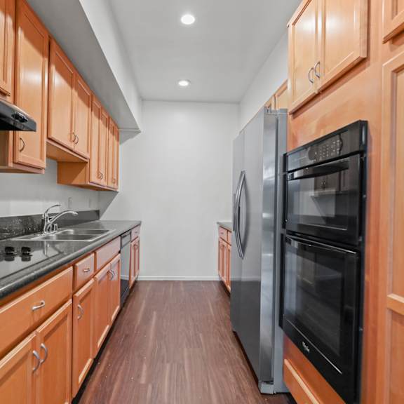kitchen with energy-efficient appliances and ample cabinet storage