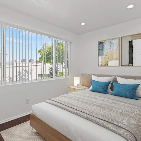 bedroom with vinyl flooring, recessed lighting, and large window