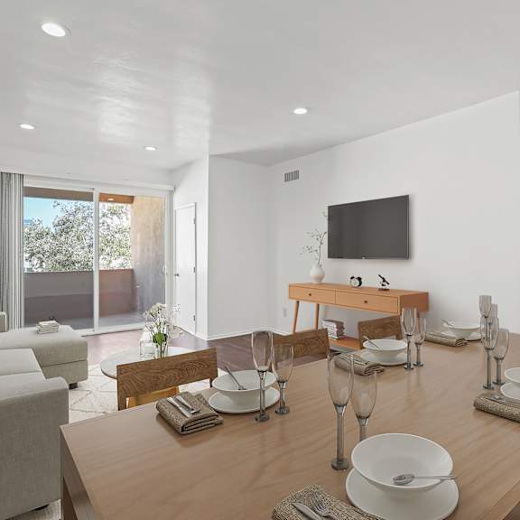 dining and living room space with recessed lighting, vinyl flooring, and spacious patio