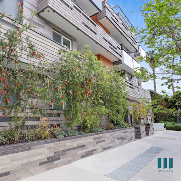sidewalk view of wilcox bea by wiseman