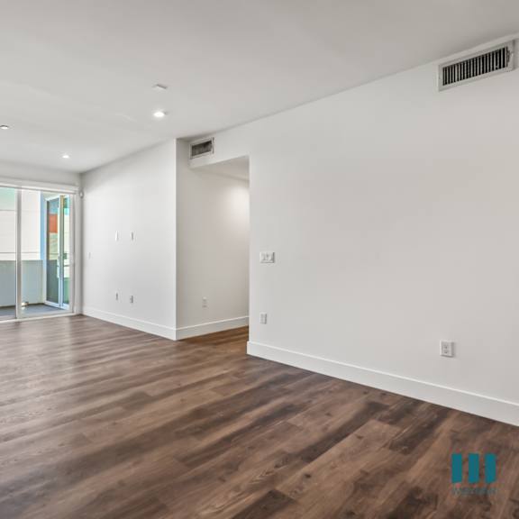 living room with recessed lighting, vinyl flooring, and patio