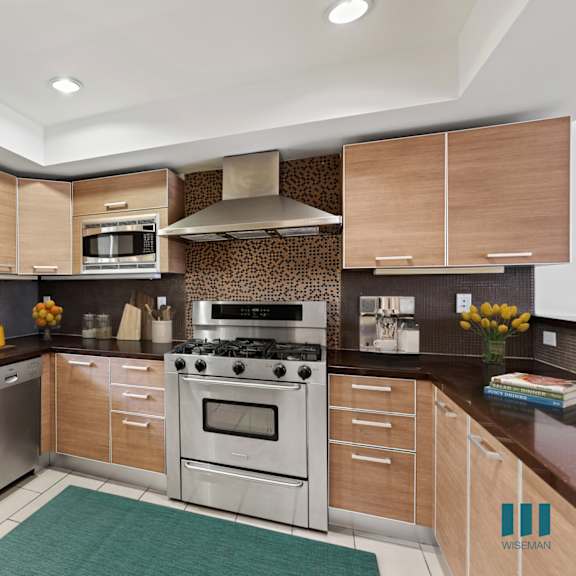 full-size kitchen with energy-effcient appliances and ample cabinet storage