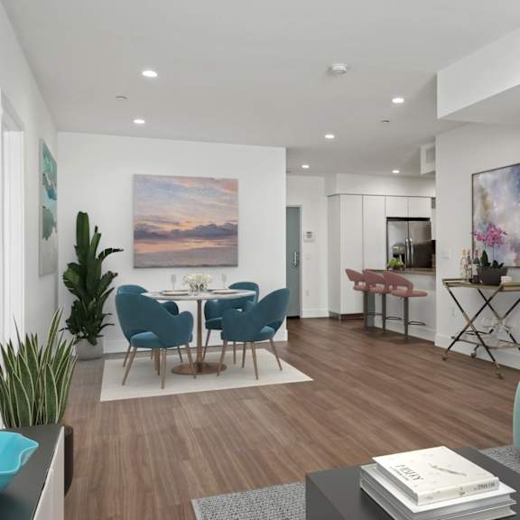 open-concept dining and living room with vinyl flooring and recessed lighting