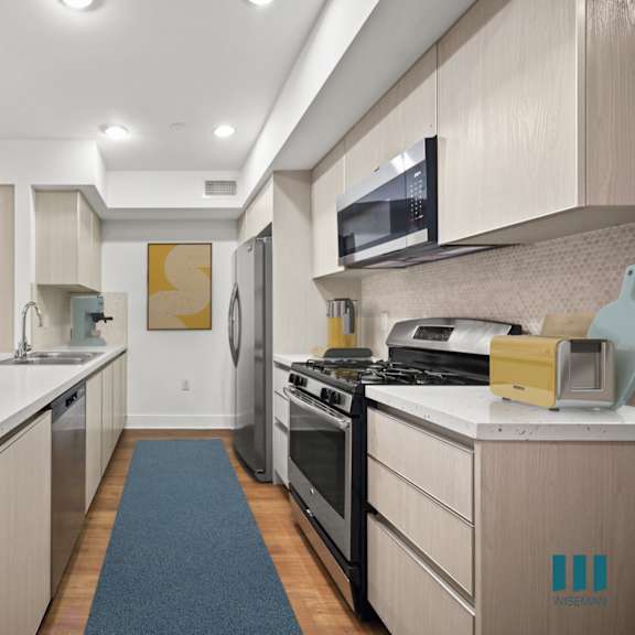 kitchen with energy-efficient appliances and ample cabinet storage