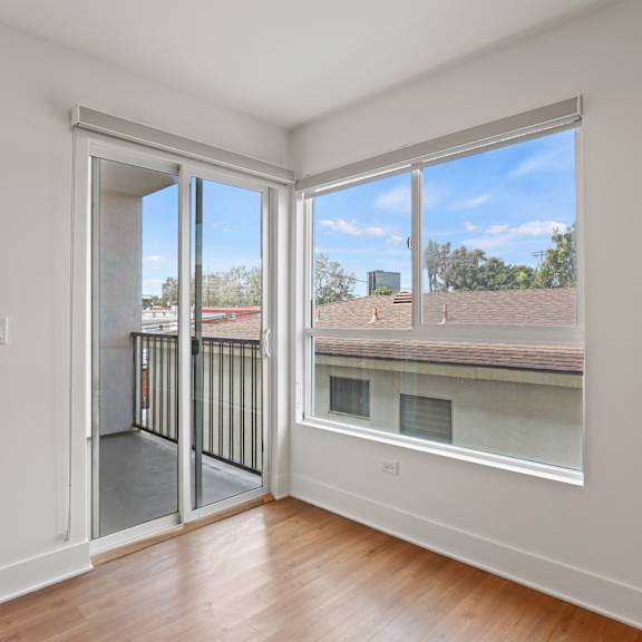 living room with large windows and patio