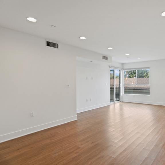 spacious living room with patio