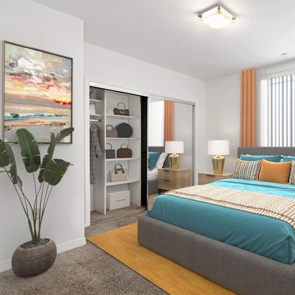 bedroom with mirrored closet with shelving and large windows