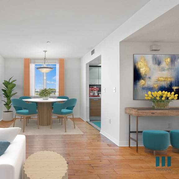 front entryway and dining room with vinyl flooring