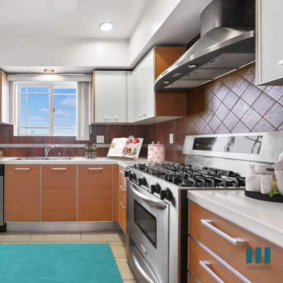 full-size chefs kitchen with stainless-steel appliances and ample cabinet storage