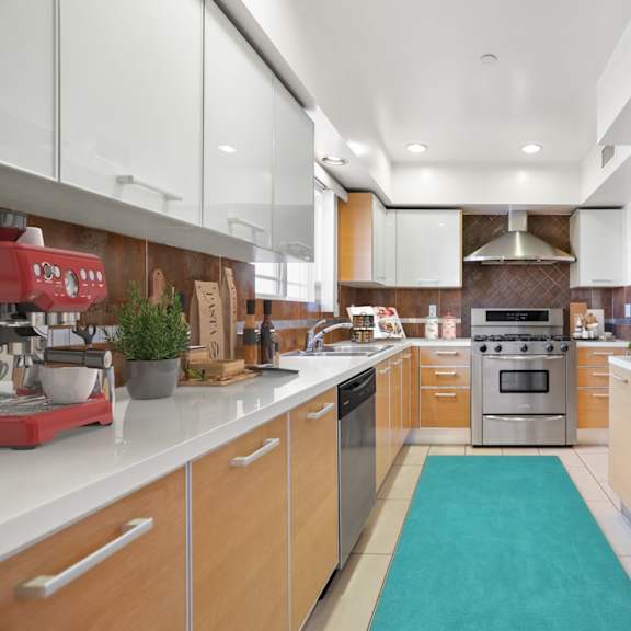 full-size kitchen with wnergy-efficient refrigerator, stove, microwave oven, and dishwasher
