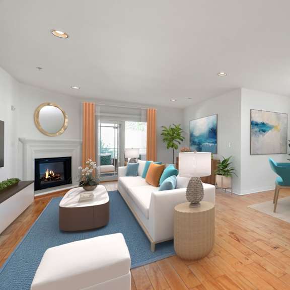 open-concept dining and living room with fireplace and spacious patio