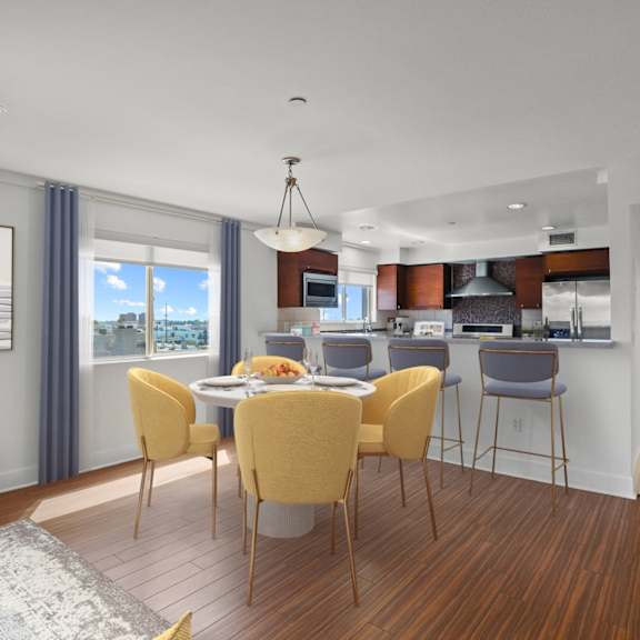 open-concept kitchen and dining space with countertop bar