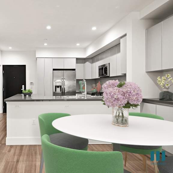 open-concept kitchen and dining room with hall closet and built-in storage cabinets