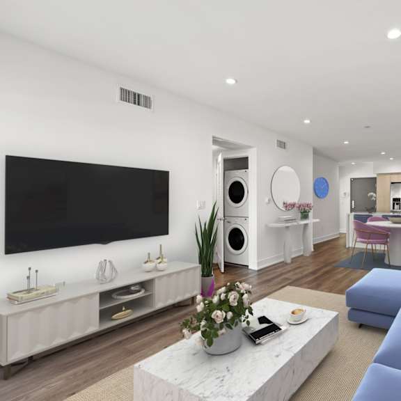 living room, dining, kitchen, and in-suite washer & dryer