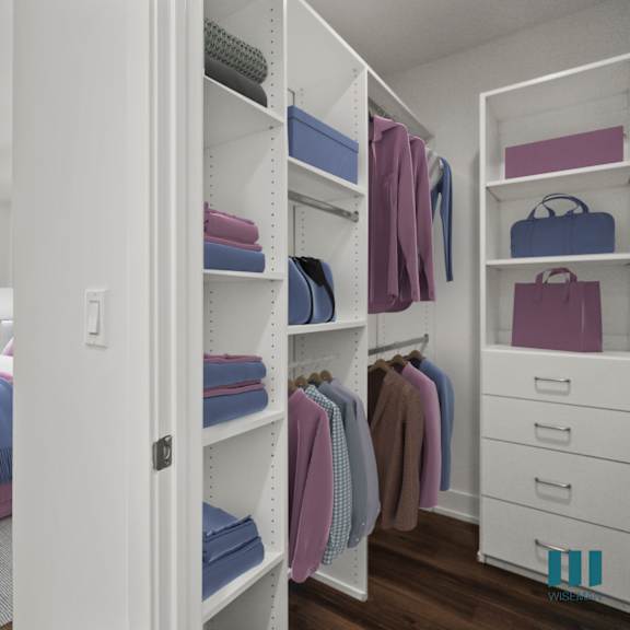 bedroom with vinyl flooring, recessed lighting, and walk-in closet with built-in organizers