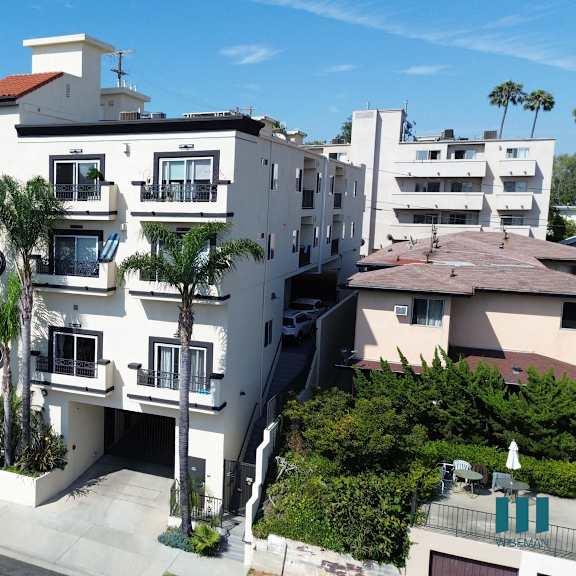 exterior street view of colby villas by wiseman