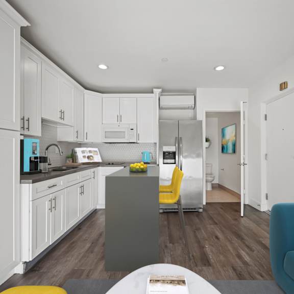 open-concept kitchen, dining, and living room