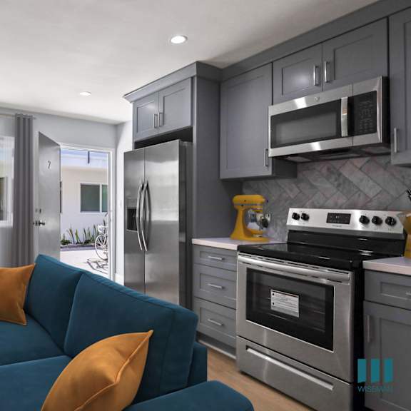 open-concept kitchen, dining, and living room