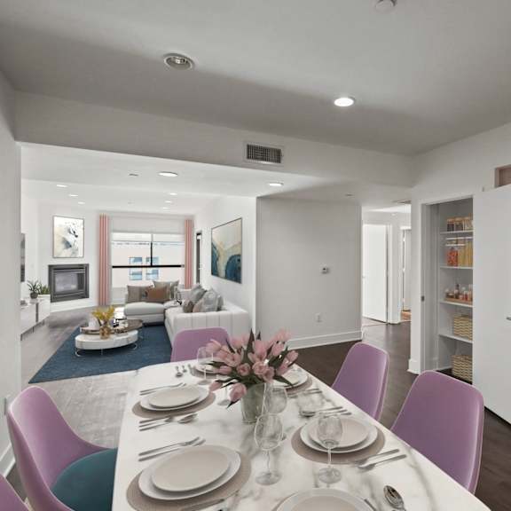 open-concept kitchen, dining, and living room with hall closet with shelving