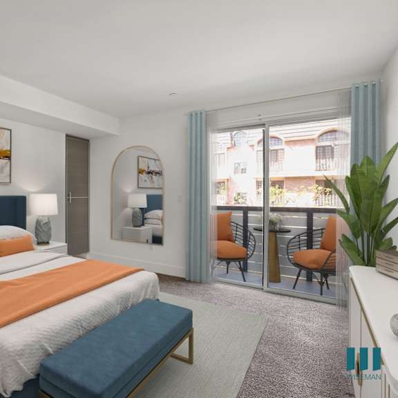 bedroom with built-in storage cabinets and patio