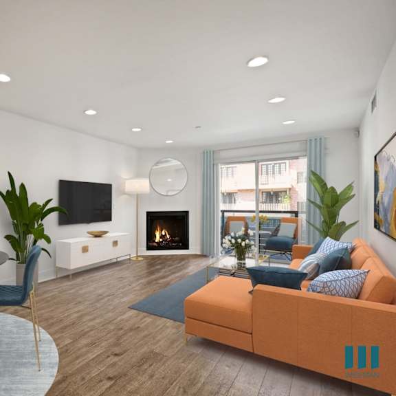 dining and living room with electric fireplace and patio