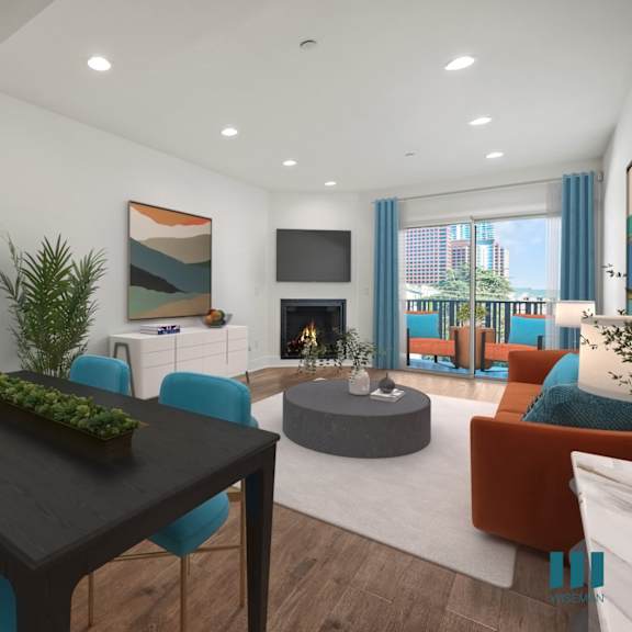 open-concept dining and living room space with a patio