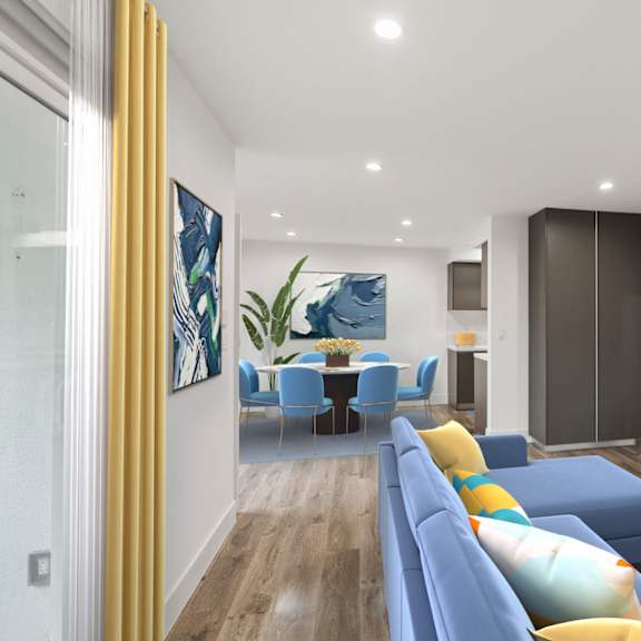 open-concept dining and living room with storage cabinet and patio