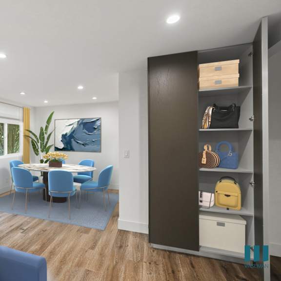living room with storage closet with shelving