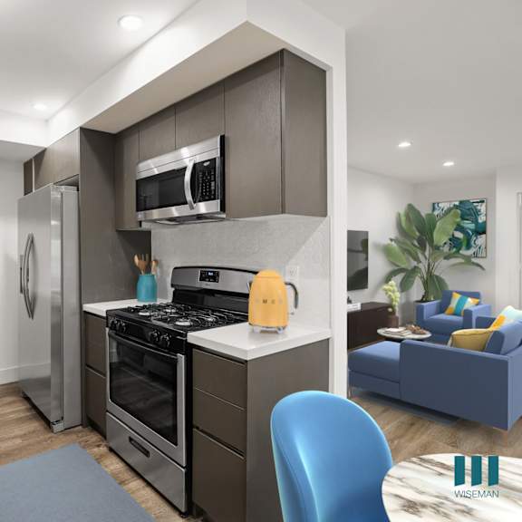 kitchen with stainless-steel refrigerator, stove, microwave oven, and patio