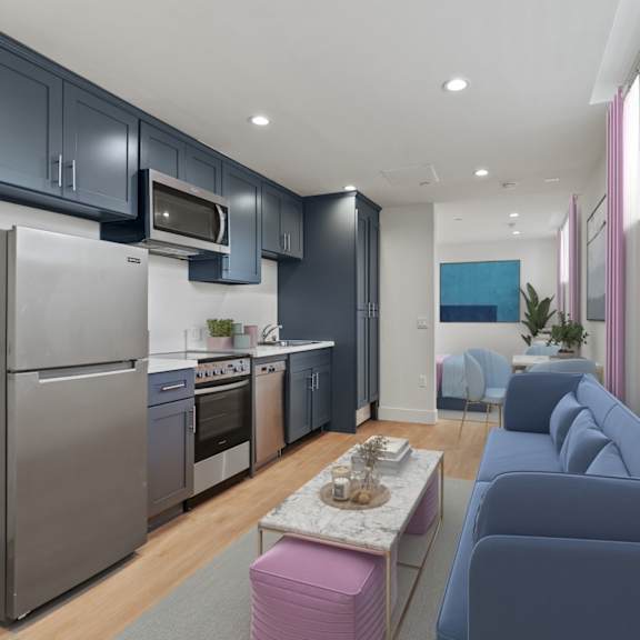 studio with full kitchen, dining, and living room