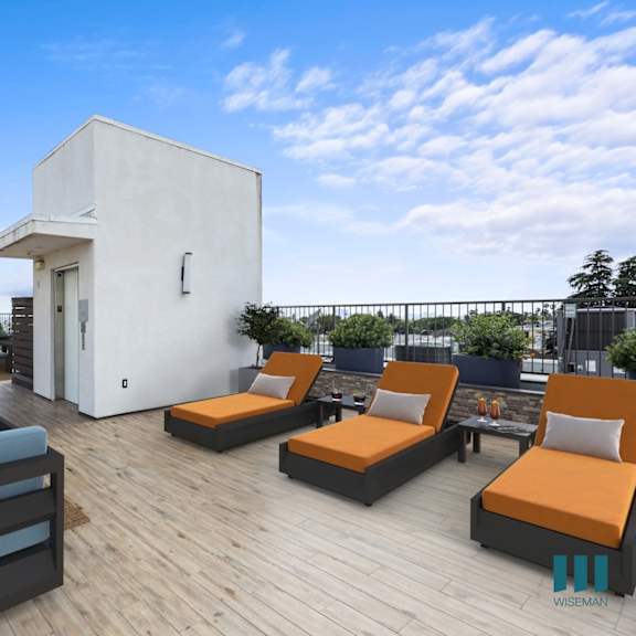 rooftop terrace with entertainment and seating area