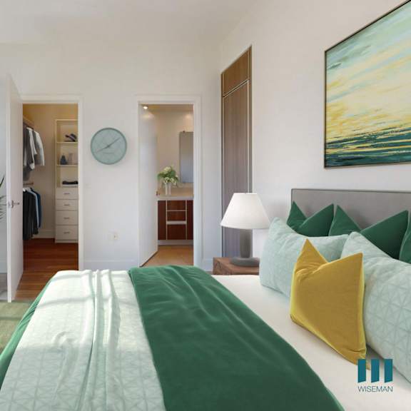 bedroom with bathroom, walk-in closet with built-in organizers, and balcony with large-size windows