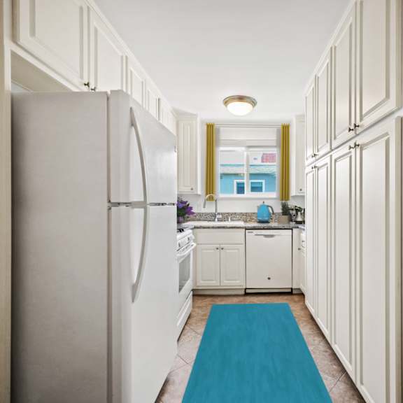 kitchen with refrigerator, stove, microwave oven, dishwasher, and ample cabinet storage