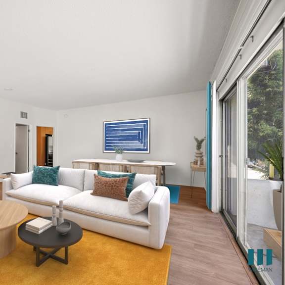 a living room with a couch and a coffee table