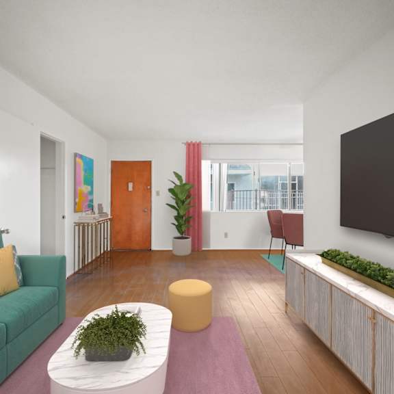 entryway, living, and dining room with windows