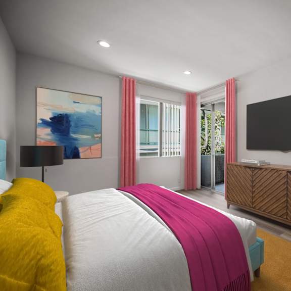 a bedroom with a large bed and a flat screen tv mounted on the wall.