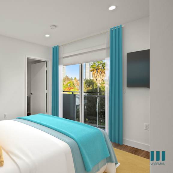 a bedroom with a white bed and a painting on the wall.