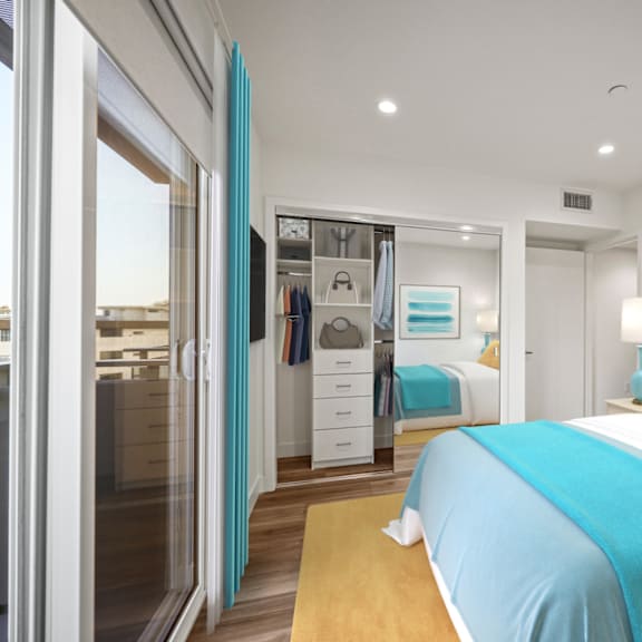 a bedroom with a large bed and a painting of a beach on the wall.