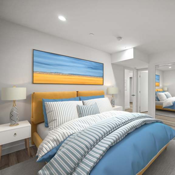 a bedroom with a large bed and a painting on the wall.