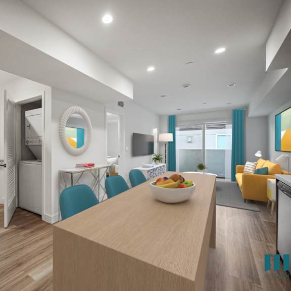 a modern kitchen with a wooden island and blue chairs.