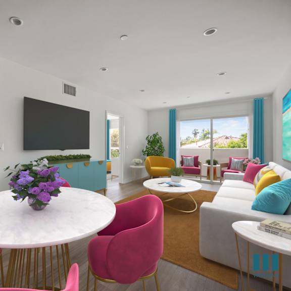 open-concept dining and living room space with a patio