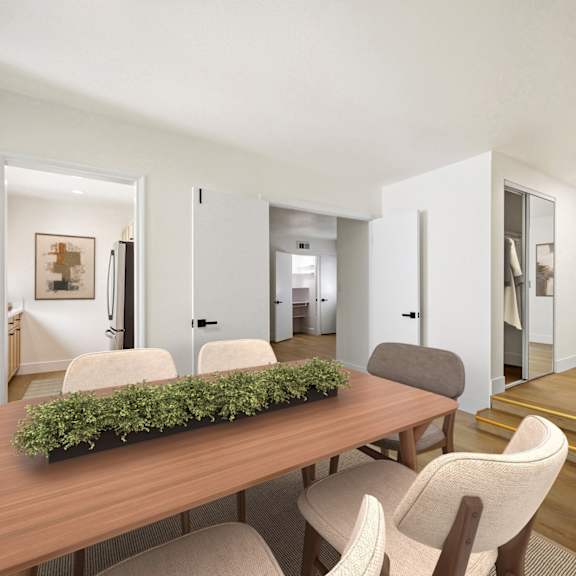 living room with vinyl flooring and a hall closet